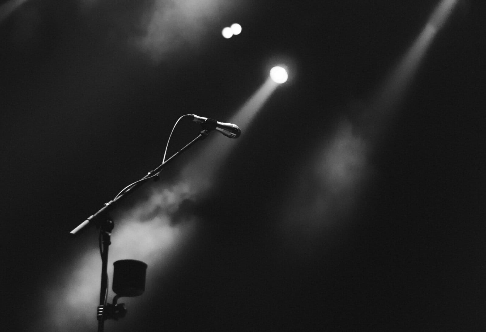 Effective Strategies for Promoting Your Music on Social Media 1 photo of microphone on foggy stage